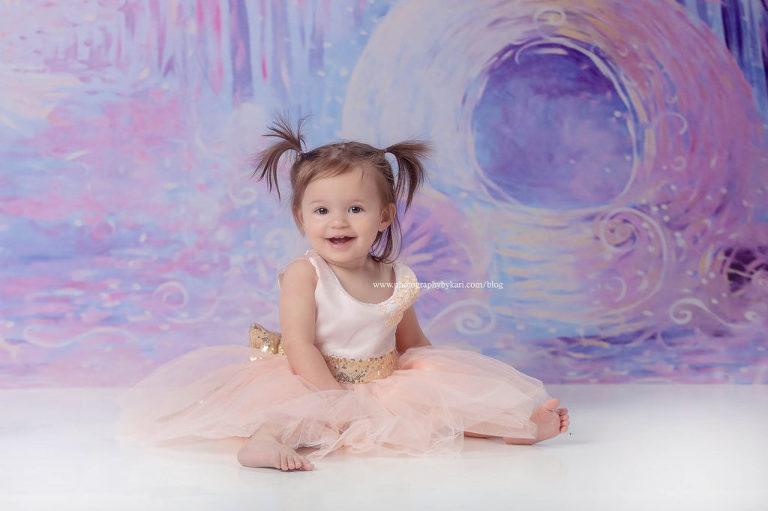 One year old in princess pink dress