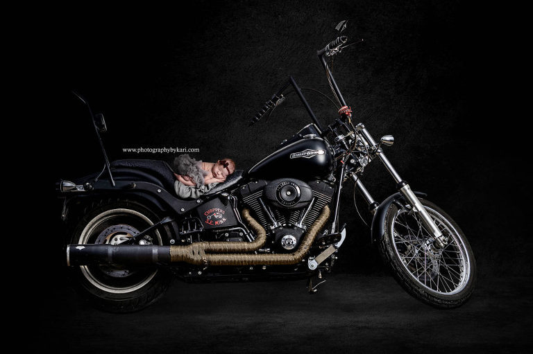 newborn composite photo with motorcycle photographed by Photography by Kari