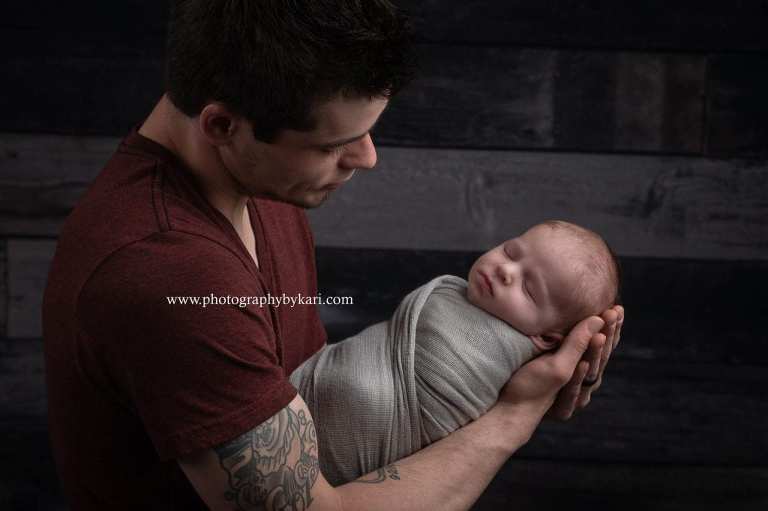 dad with newborn portrait