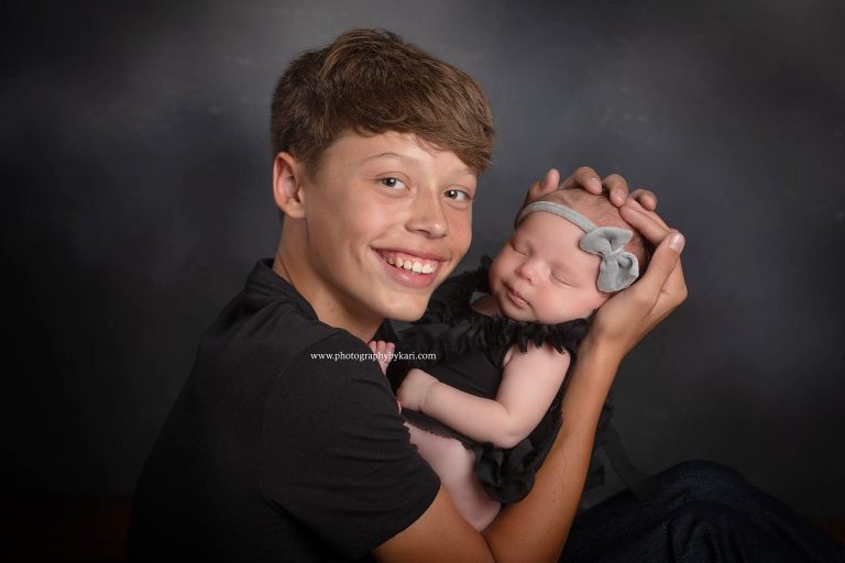 MN Newborn girl portrait with teen big brother