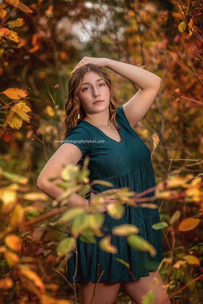 Senior girl portrait with fall leaves