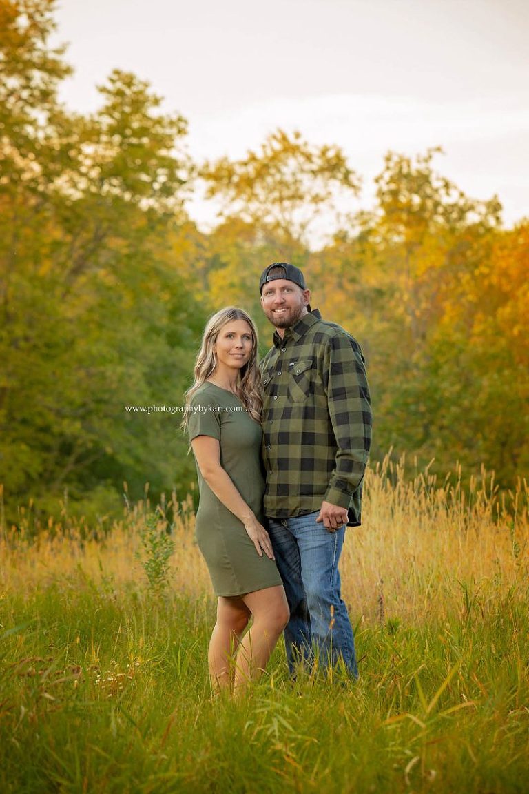 MN Family Photograph of couple in tall grass