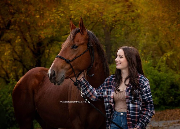 Senior Portrait with brown horse