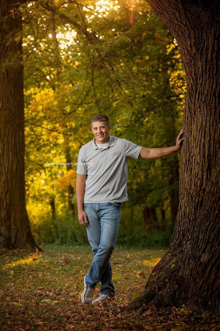 Mason poses casually for his MN senior pictures.