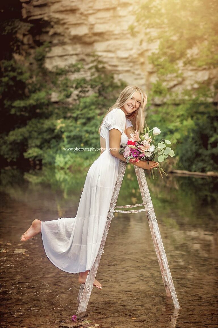 SE MN Senior girl portrait on ladder in water at Masonic Park in Spring Valley, MN  by Photography by Kari