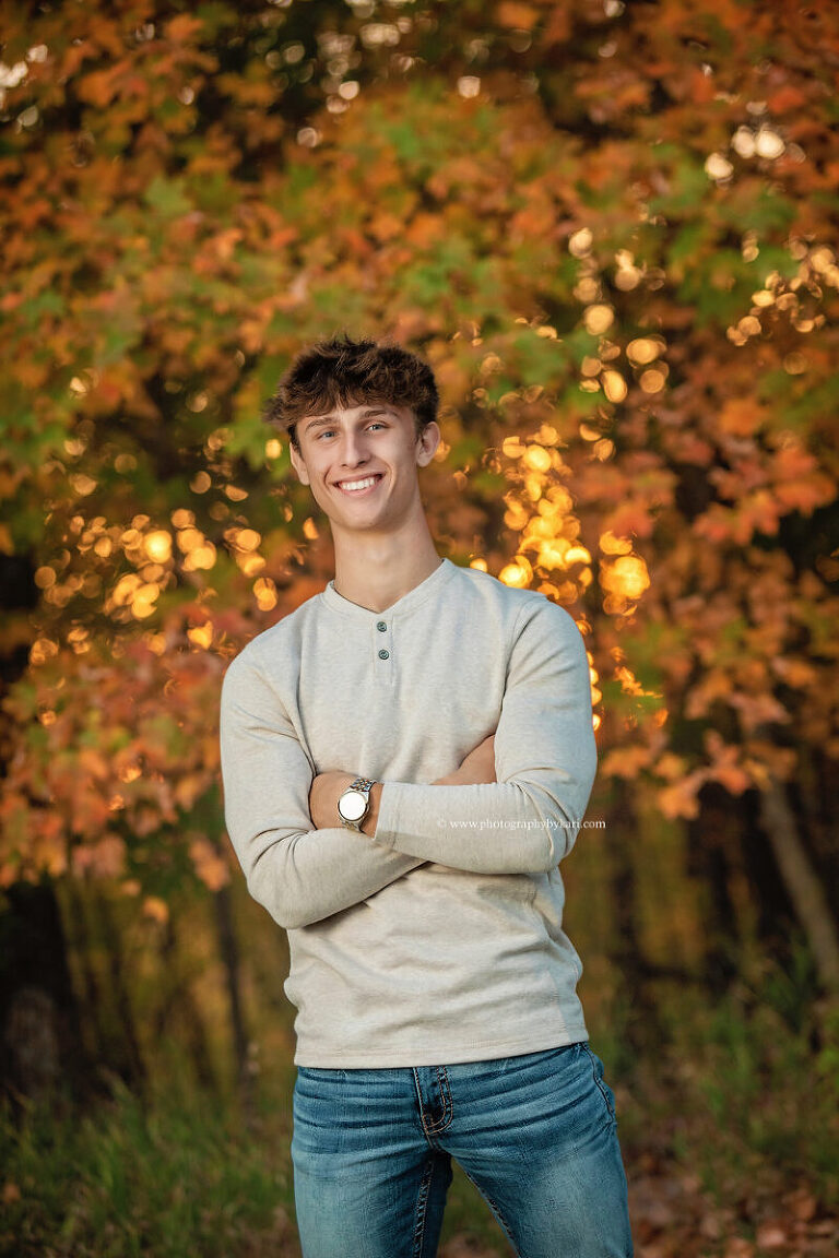 MN senior photo of boy taken at Good Earth Village in Spring Valley MN  by Photography by Kari