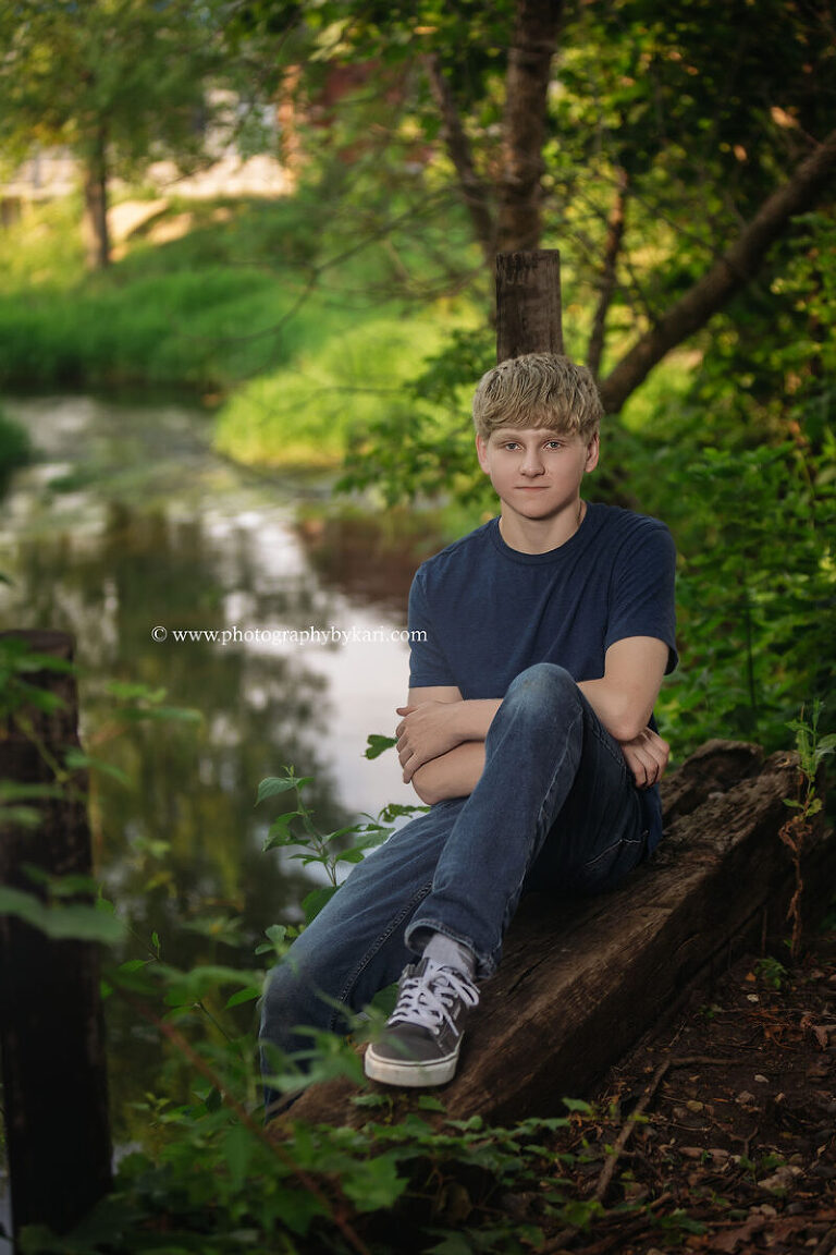 Senior portrait of boy in downtown Spring Valley Minnesota