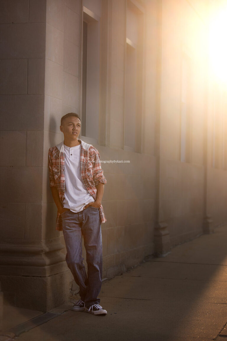 Senior photo in downtown Spring Valley with golden hour light"