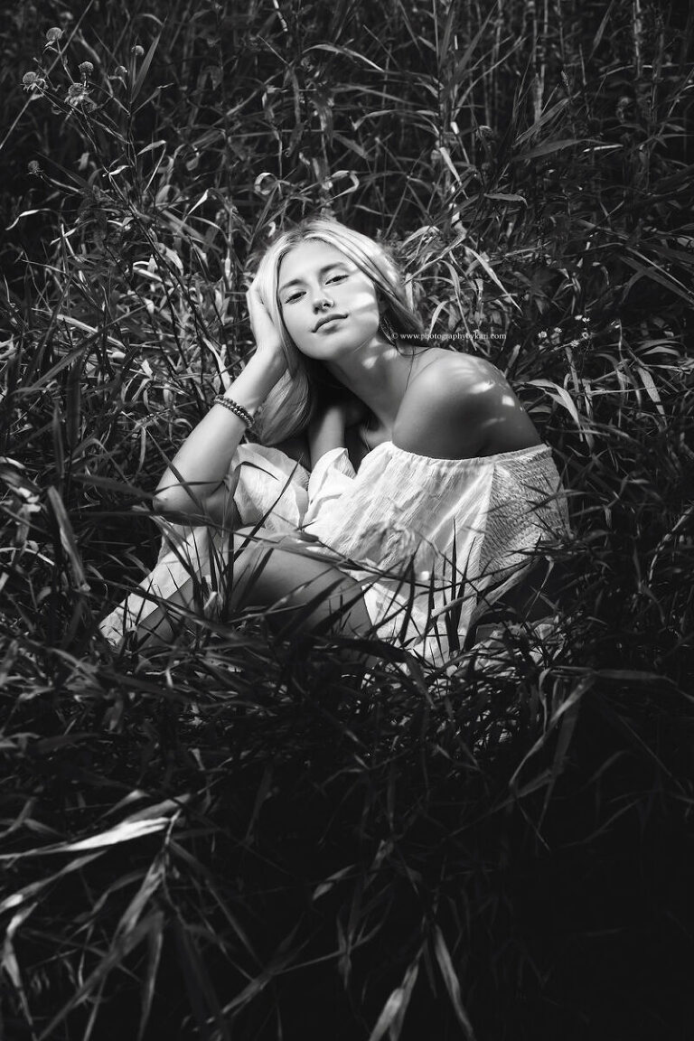 Outdoor senior photo in rural Spring Valley Minnesota with natural background