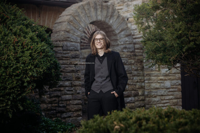 Mayo High School senior boy posing at Plummer House in Rochester MN