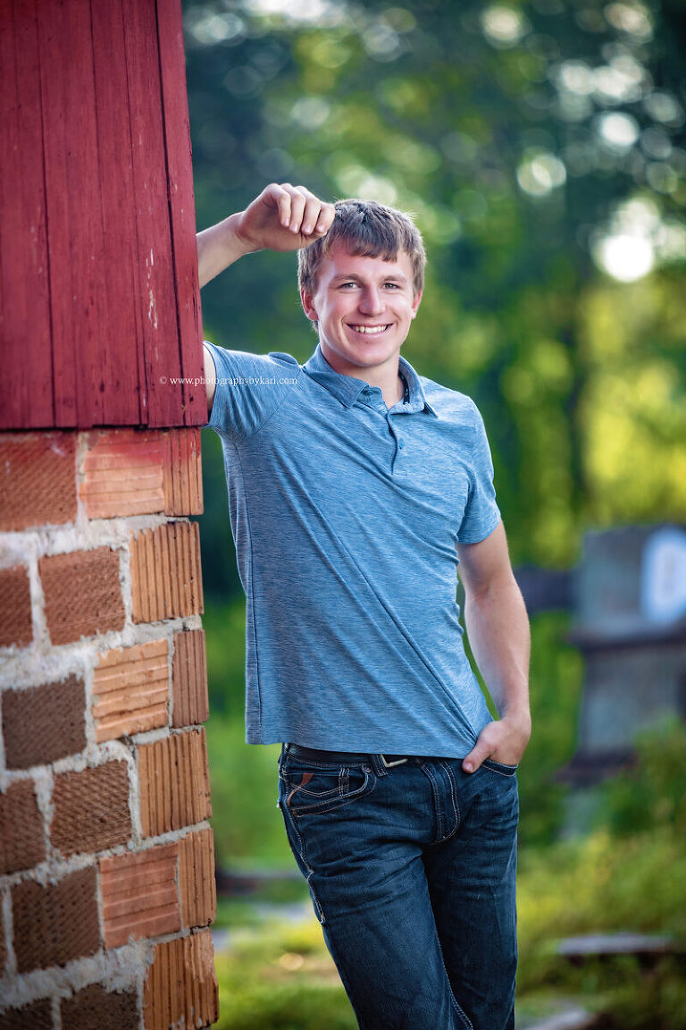 Kingsland senior boy photographed outdoors on family land
