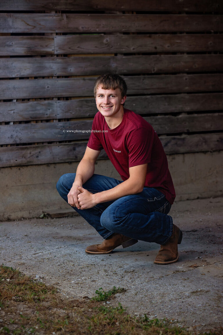 Kingsland senior boy photographed outdoors on family land in Southeast Minnesota