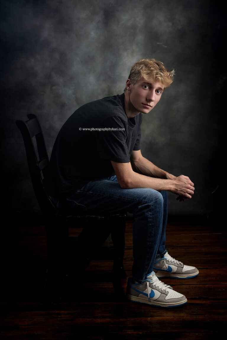 Stewartville High School senior boy in formal studio portrait"