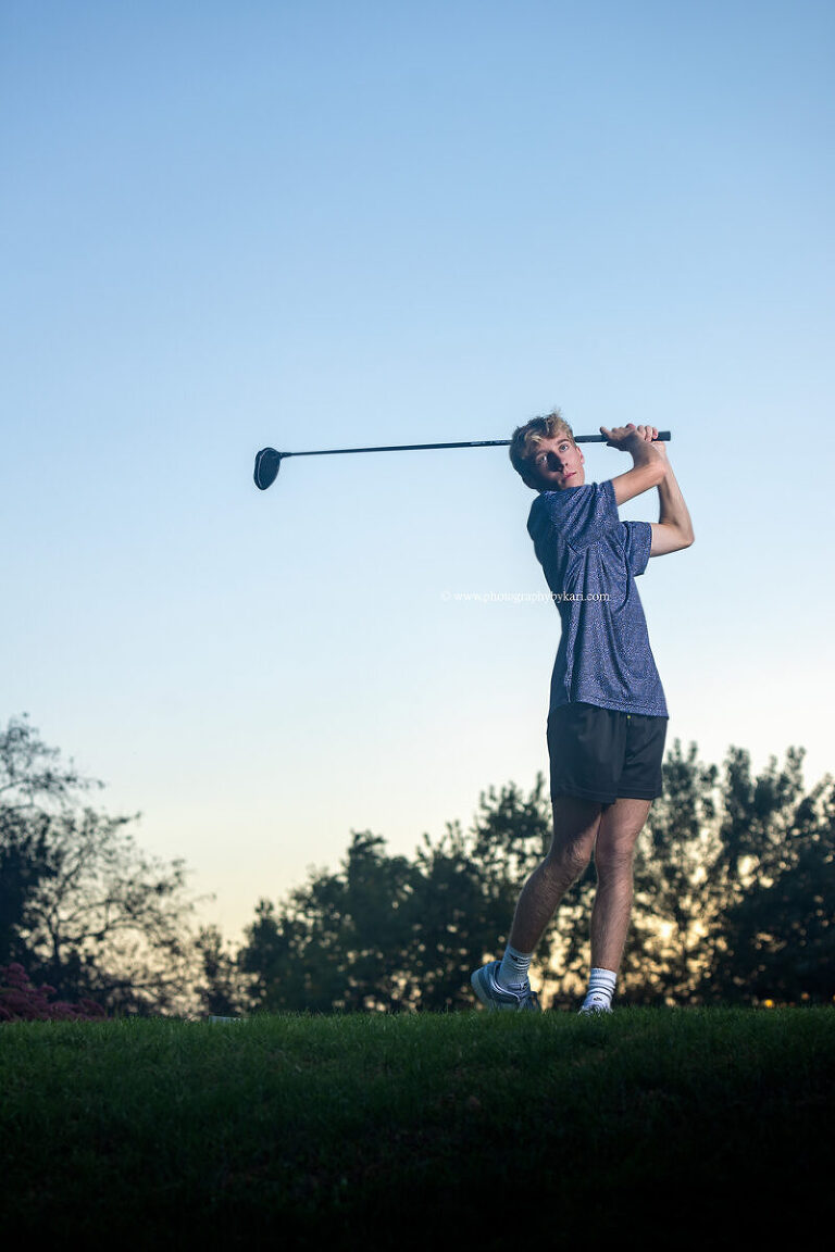 Scenic senior photo on bluffs overlooking Lanesboro Minnesota