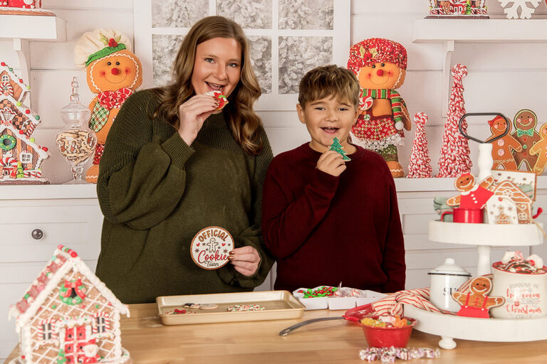 Mom and son baking gingerbread cookies during Christmas mini session in Spring Valley MN