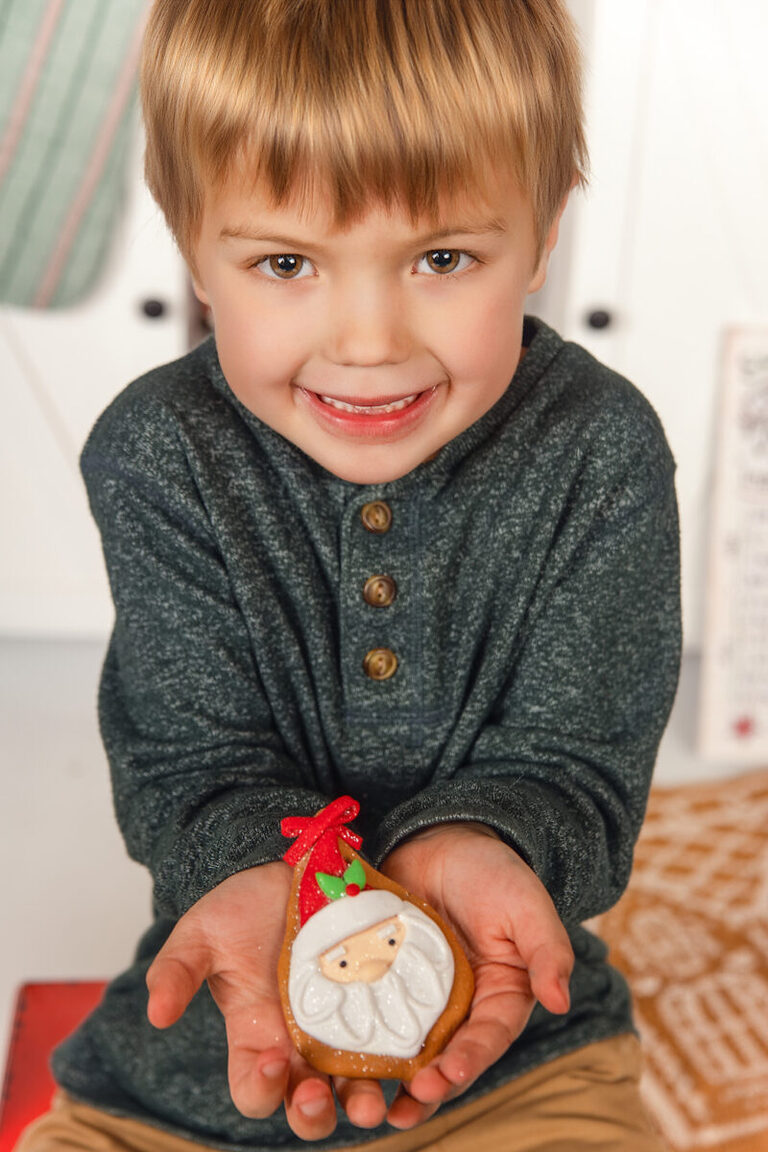 Kids laughing and baking cookies during gingerbread Christmas mini session SEMN