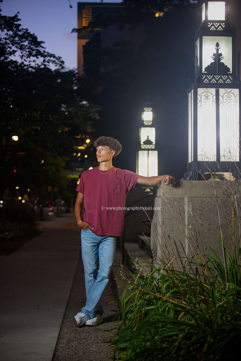 Downtown Rochester Minnesota senior portrait with city lights