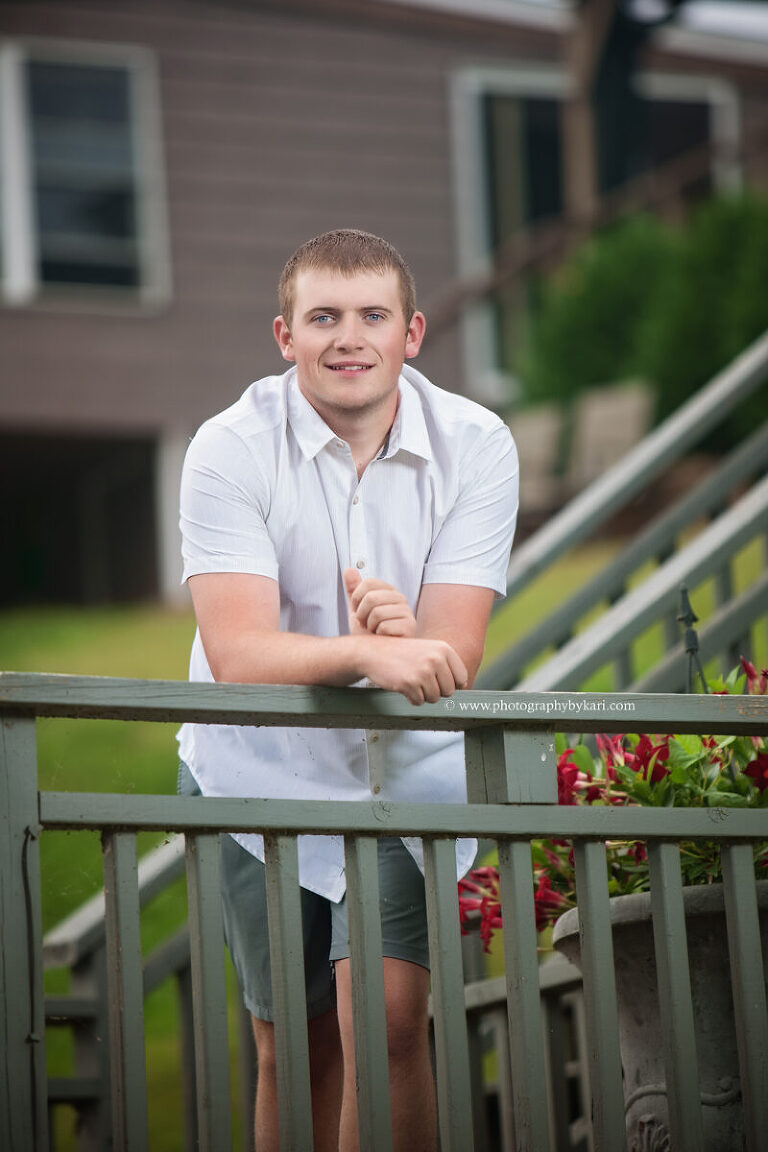 Senior boy at family cabin near Faribault Minnesota