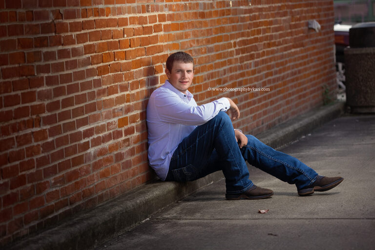 Senior boy portrait in downtown Lanesboro Minnesota