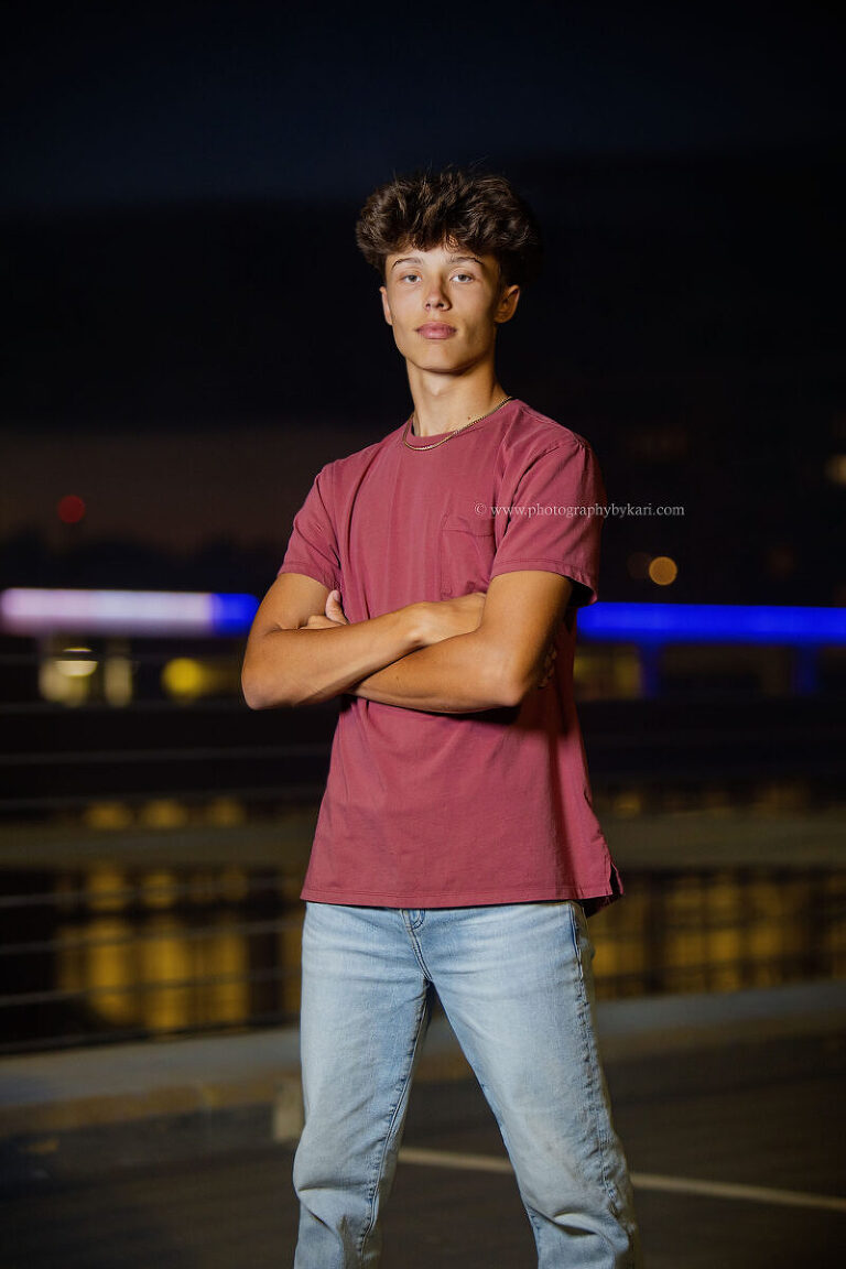 Downtown Rochester Minnesota senior portrait with city lights