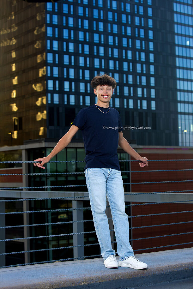 Downtown Rochester Minnesota senior portrait with city lights