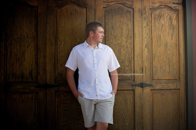 Senior boy portrait in downtown Lanesboro Minnesota