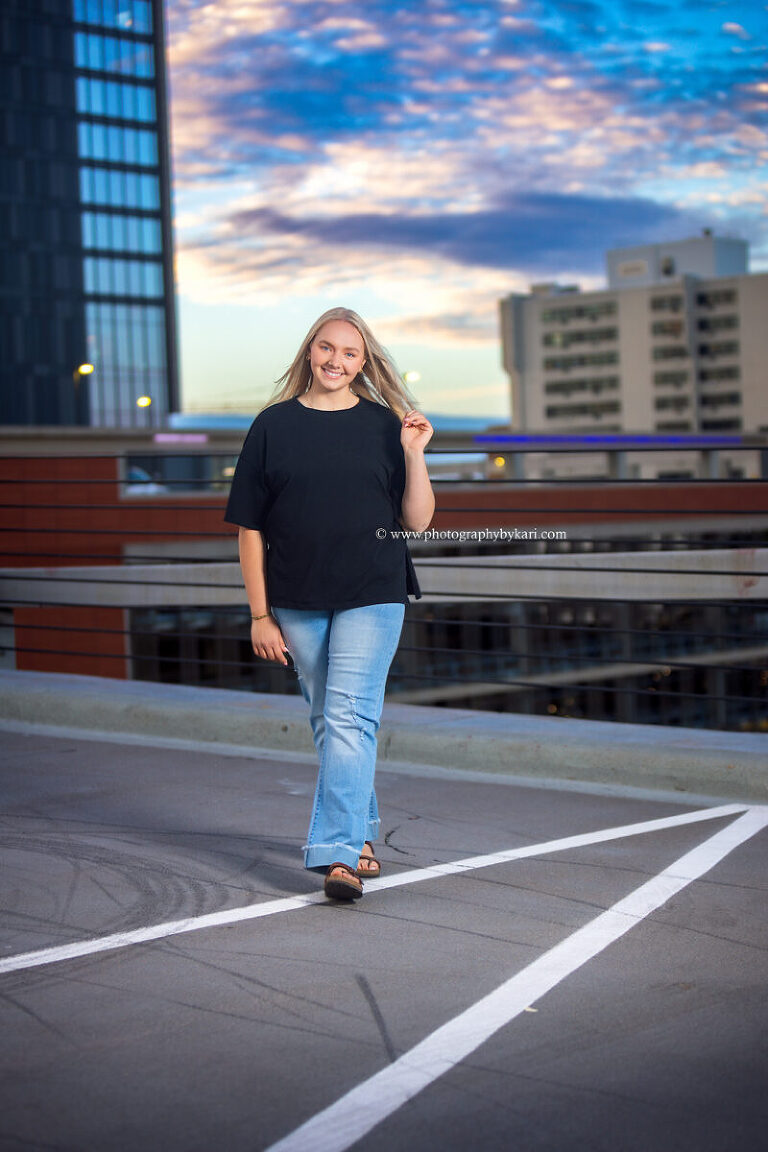 Senior girl portrait with downtown Rochester skyline view
